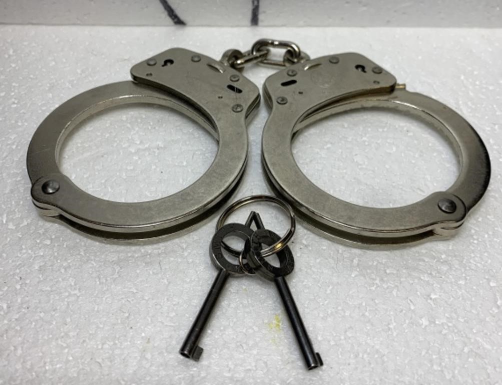 Hand cuffs with keys