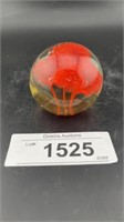 Clear and red paperweight