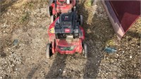 5.5-HP Toro Super Recycler Wall Behind Lawnmower