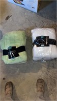 Two brand new, micro plush blankets, never used.