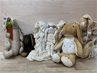 Box lot of stuffed rabbits and rag dolls