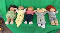 Box of Cabbage Patch dolls