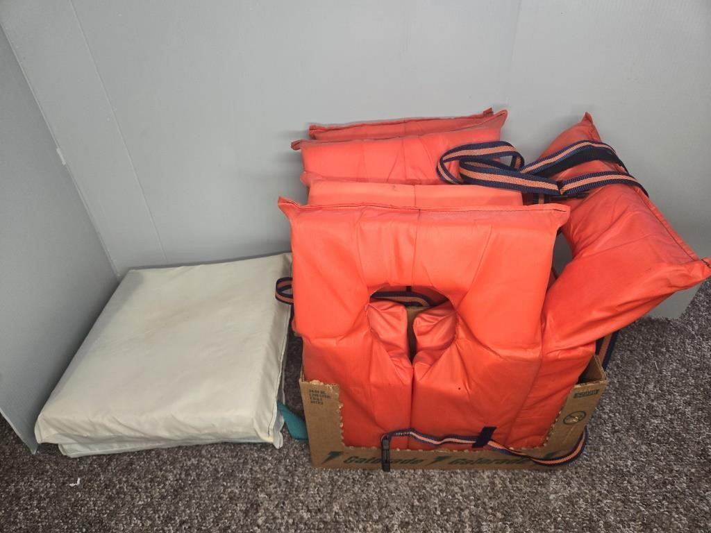 (5) LIFE JACKETS AND (2) FLOTATION CUSHIONS