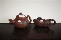 2 Yixing teapots, one a covered pumpkin shaped