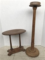 Two wood pedestal stands