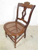 Brown Wooden Chair w/ Wicker Type Seat