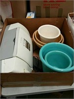 Box of flower pots and printer