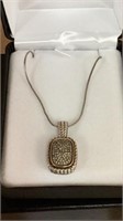 Sterling silver and 14 karat gold diamond necklace