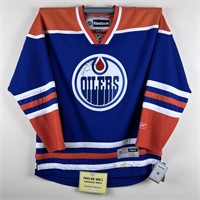 TAYLOR HALL AUTOGRAPHED JERSEY