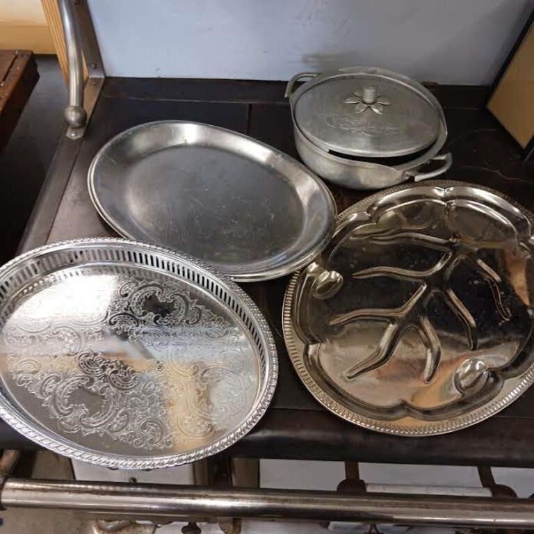 Silver platters and pan with lid