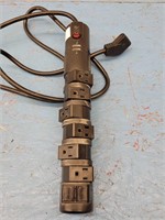SURGE PROTECTOR WITH RELOCATABLE POWER TAPS