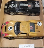 2 UNIVERSAL HOBBIES 1/18 DIECAST FORD TOY CARS