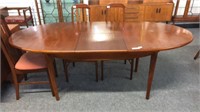 MID CENTURY DINING TABLE WITH A POP-UP LEAF,