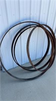 (4) CAST IRON RINGS