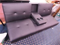 Black upholstered bench that converts into a