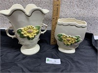 Hull white vases with yellow flowers