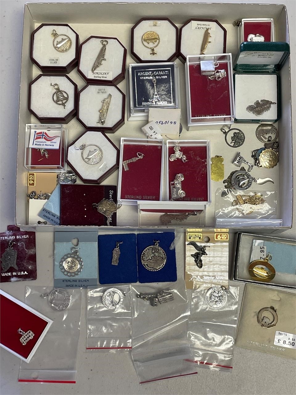 Large lot of sterling silver charms