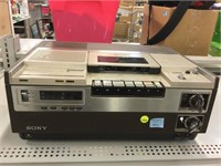Vintage Sony simulated wood cabinet media player.