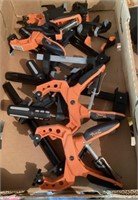 Group of hand clamps and bar clamps