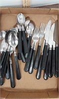 Black handled silverware. 3 Forks, 8 teaspoons, 7