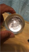 1885 silver dollar inside clear 3”round ball