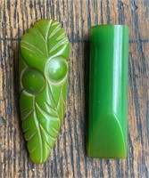 Two Bakelite Carved Clips
