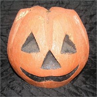 Vintage Jack O Lantern carved from an old coconut