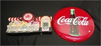 Two various Coca Cola advertising pieces