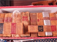 10 mostly leatherbound volumes of Illinois laws;