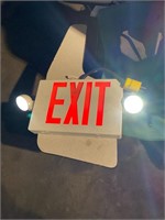 3 lighted exit signs