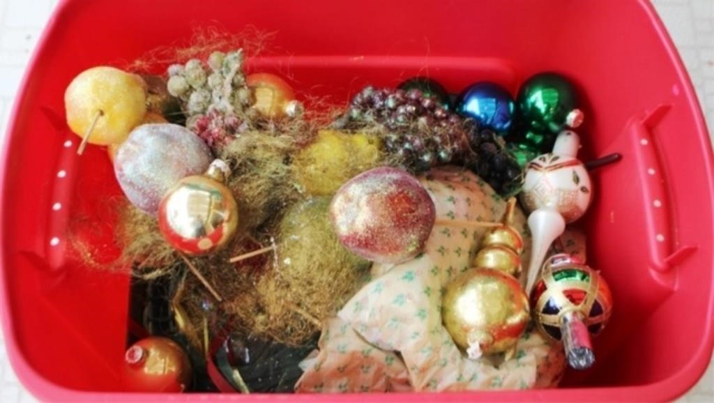 Plastic Tote Full of Christmas Ornaments