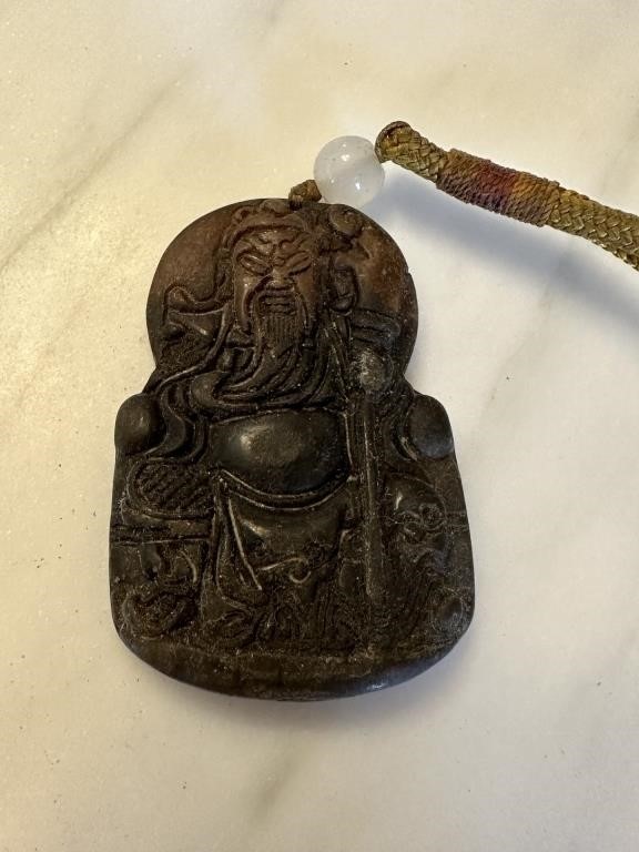 CHINESE CARVED STONE PENDANT