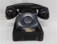 Bell System telephone, damaged