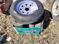 Tire and rim ("new") and box of lawn mower tires a