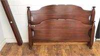 Full sized solid wood bed frame.