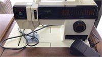 Singer Imperial sewing machine in cabinet. Machine