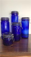 5 pc Cobalt glass canister set. These have rubber