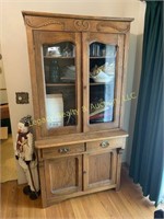 Oak step back cupboard (contents not included)