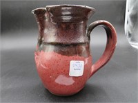 Brown and Red Ceramic Water Pitcher.
