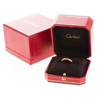 A Lady's 18K Wedding Band by Cartier