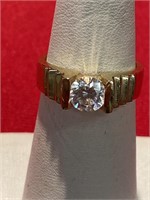 14 K ring. Size 7 1/2. Possible CZ stone. Single