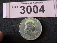 Uncirculated 1960 D Franklin silver half dollar