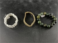3 Bracelets: 1 is fashion tennis bracelet, 1 is ja