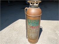 Antique brass fire extinguisher