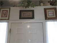 Three Framed Prints above Door