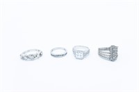 Collection of four sterling silver rings