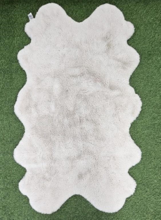 FAUX FUR RUG - 72" X 42" - NEEDS A WASH