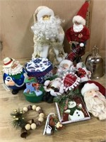 Box of Christmas decorations and santa figures