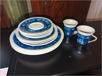 Vintage dish set cops have minor chips and