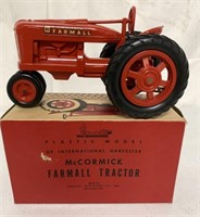 1/16 McCormick Plastic Tractor with Box